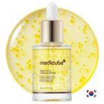 Medicube Deep Vita C Capsule Serum bottle showing visible yellow vitamin liposome capsules inside.